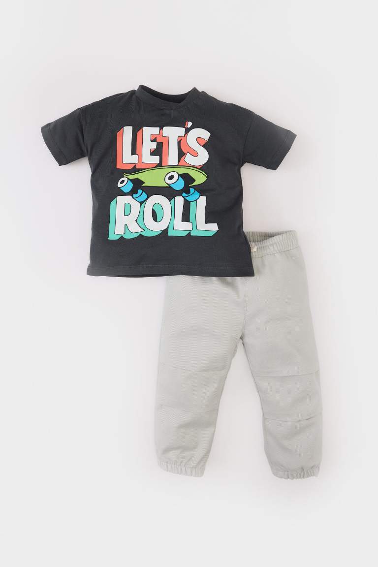 E5988A5_25SM_AR202_01_01.jpg Boys' 2-Piece Skate Print Short Sleeve T-Shirt and Elastic Waist Sweatpants Set